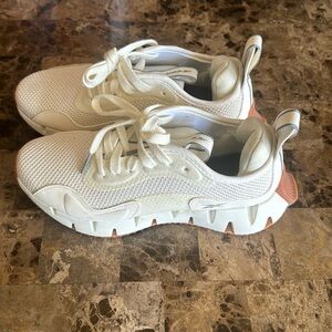 Cream Reebok sneakers